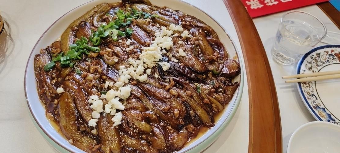 51. Баклажаны по-дадунски с мясным соусом